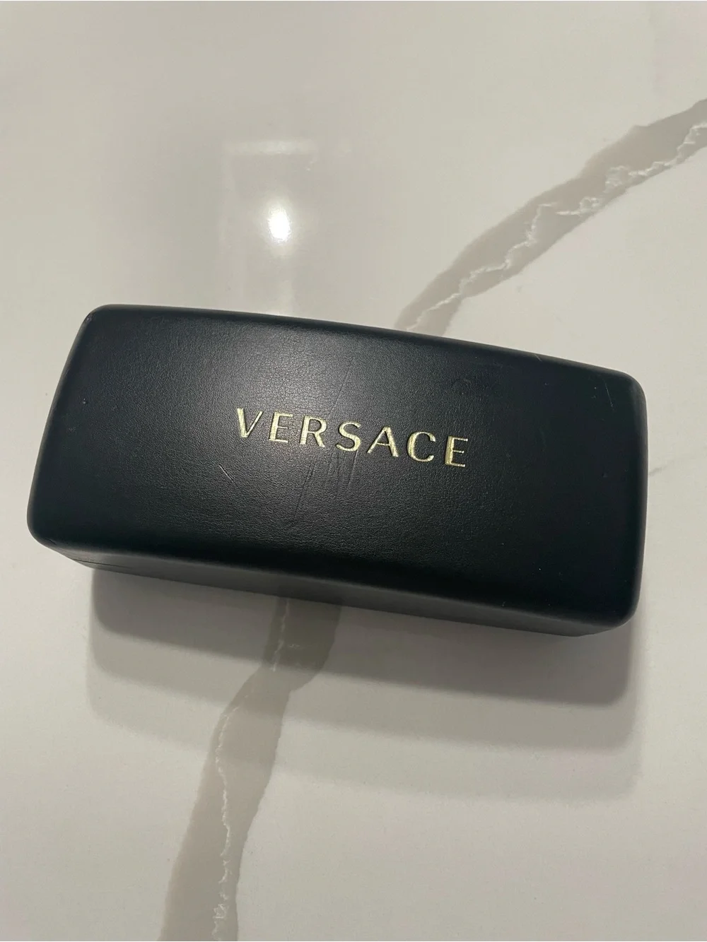 Gucci bold shield